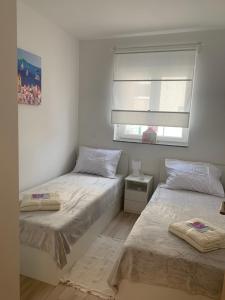 Krevet ili kreveti u jedinici u objektu Turquoise Apartments unit 1