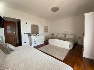 Letto o letti in una camera di Il Pagio