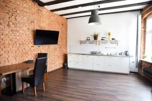 Η κουζίνα ή μικρή κουζίνα στο Perfect Stay - "Apartamenty Horzyca"