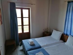 Posteľ alebo postele v izbe v ubytovaní Lefkada Villas by Omikron Selections
