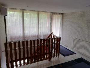 Posteľ alebo postele v izbe v ubytovaní Maci Vendégház