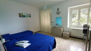 Łóżko lub łóżka w pokoju w obiekcie Casa vacanze da Cristina app B