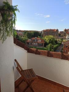 Balkón nebo terasa v ubytování Duplex céntrico en Noja con acceso a spa relax.
