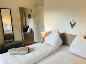 Łóżko lub łóżka w pokoju w obiekcie Wohlfühl-Appartement Kreischberg inclusive Murau SommerGästeCard