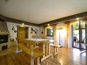 a kitchen with a large island in the middle of a room at Pokoje Gościnne Poniatowscy in Świeradów-Zdrój