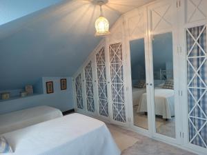 Postel nebo postele na pokoji v ubytování Duplex céntrico en Noja con acceso a spa relax.