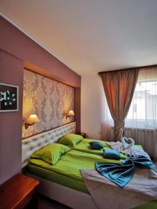 Postel nebo postele na pokoji v ubytování Zigen House