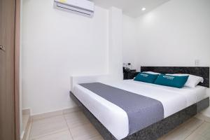 Postel nebo postele na pokoji v ubytování Hotel Esperanza AC