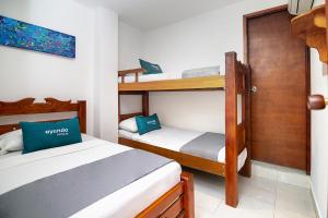 Hotel Esperanza AC tesisinde bir ranza yatağı veya ranza yatakları