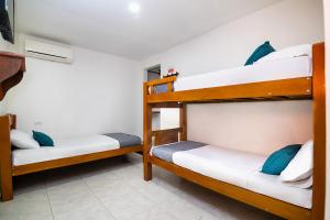 Postel nebo postele na pokoji v ubytování Hotel Esperanza AC
