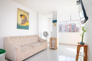 TV a/nebo společenská místnost v ubytování Hotel Esperanza AC