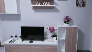 TV a/nebo společenská místnost v ubytování Casas Holiday - playa Acequion