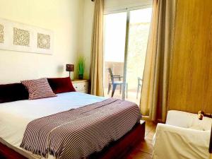Posteľ alebo postele v izbe v ubytovaní Ed Senses Apartamento Wellness