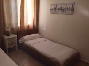 Posteľ alebo postele v izbe v ubytovaní Ed Senses Apartamento Wellness