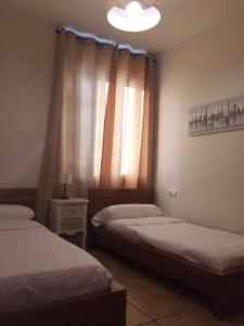 Posteľ alebo postele v izbe v ubytovaní Ed Senses Apartamento Wellness