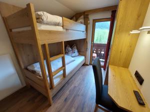 Posteľ alebo postele v izbe v ubytovaní Oberauhof Chalet
