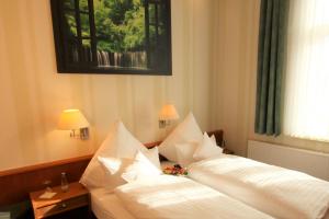 Ένα ή περισσότερα κρεβάτια σε δωμάτιο στο Hotel Mohr & Spa