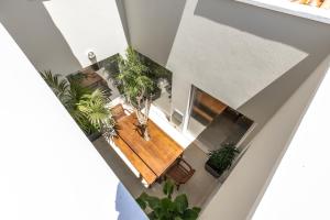 an overhead view of a living room with potted plants at Sea View Villa in Sagres