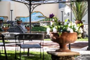 Vonkajšia záhrada v ubytovaní Hotel Garibaldi