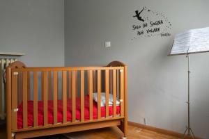 A bed or beds in a room at Appartamento Marconi 35 Pergine Valsugana