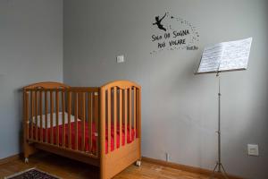 A bed or beds in a room at Appartamento Marconi 35 Pergine Valsugana