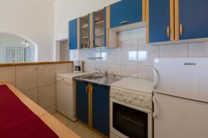 Kuchyňa alebo kuchynka v ubytovaní Apartmani Sil