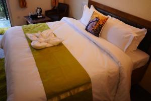 Letto o letti in una camera di Jakhu Vibes