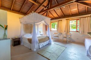 Ένα ή περισσότερα κρεβάτια σε δωμάτιο στο La hospedaria