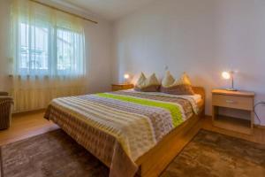 Posteľ alebo postele v izbe v ubytovaní Apartmani Sil + 37 fotografií
