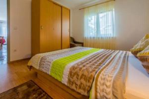 Posteľ alebo postele v izbe v ubytovaní Apartmani Sil