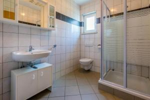 Kúpeľňa v ubytovaní Apartmani Sil