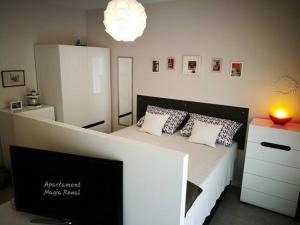 Posteľ alebo postele v izbe v ubytovaní Apartament Magia Rewal + 26 fotografií