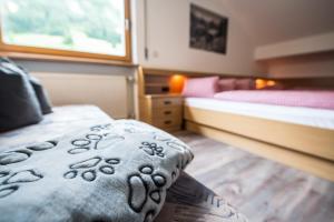 Postel nebo postele na pokoji v ubytování Hotel Sonja