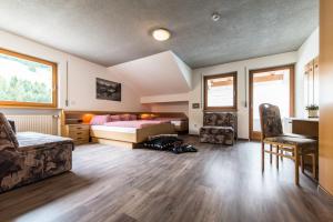 Postel nebo postele na pokoji v ubytování Hotel Sonja