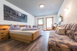 Postel nebo postele na pokoji v ubytování Hotel Sonja