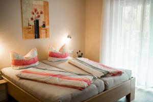 Postel nebo postele na pokoji v ubytování Paradies im Schwarzwald