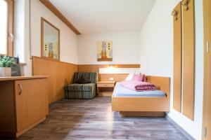 Postel nebo postele na pokoji v ubytování Hotel Sonja