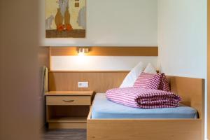 Postel nebo postele na pokoji v ubytování Hotel Sonja