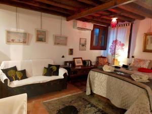 Area soggiorno di Suite Ai Leoni