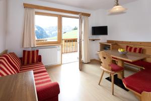 TV a/nebo společenská místnost v ubytování Apartments Etruska Gabriela