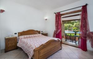 Vuode tai vuoteita majoituspaikassa Sardinia Family Villas - Villa Adina with private pool in Arzachena
