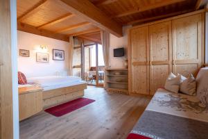 Postel nebo postele na pokoji v ubytování Apartments Etruska Gabriela