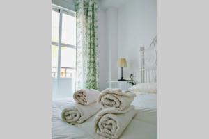 Posteľ alebo postele v izbe v ubytovaní Central Apartment in Sanlucar