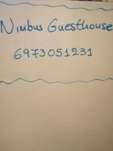 a white cake with the chemical name n nucleus at Nimbus Guesthouse in Sidhirokhórion