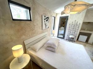 Letto o letti in una camera di Pietrefitte