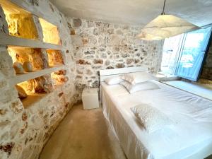 Letto o letti in una camera di Pietrefitte