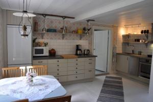 Virtuvė arba virtuvėlė apgyvendinimo įstaigoje Grönhagen