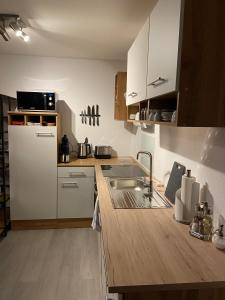 Kuchyň nebo kuchyňský kout v ubytování Haus Langweid - Moderne Ferienwohnungen mit Luxus im Inntal