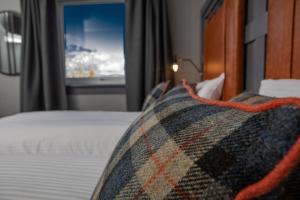 The Hebridean - Rooms & Apartments客房内的一张或多张床位