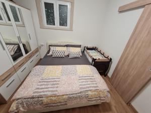Postel nebo postele na pokoji v ubytování Apartment Porat
